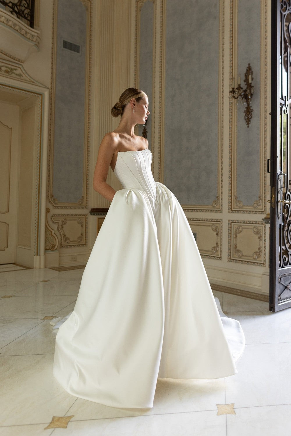 Chic And Contemporary Basque-Waist Satin Ball Gown With Pockets by Verdin Bridal — image 2 of 2