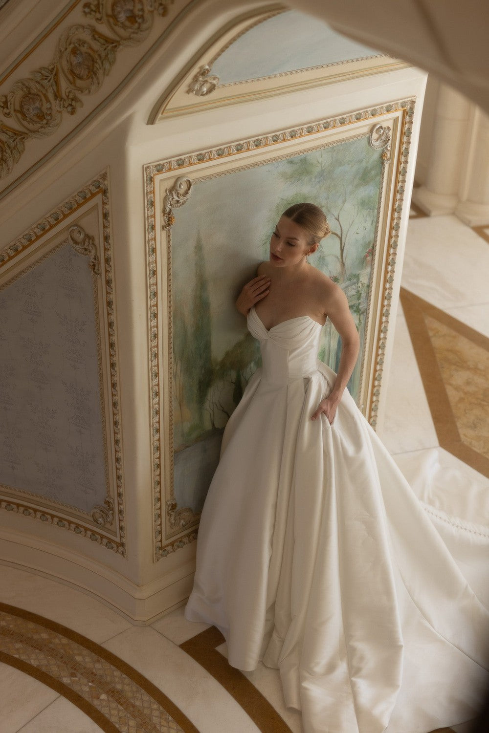 Plus-Size Chic And Classic Strapless Silk Ball Gown With Pockets And Buttons by Verdin Bridal — image 1 of 2