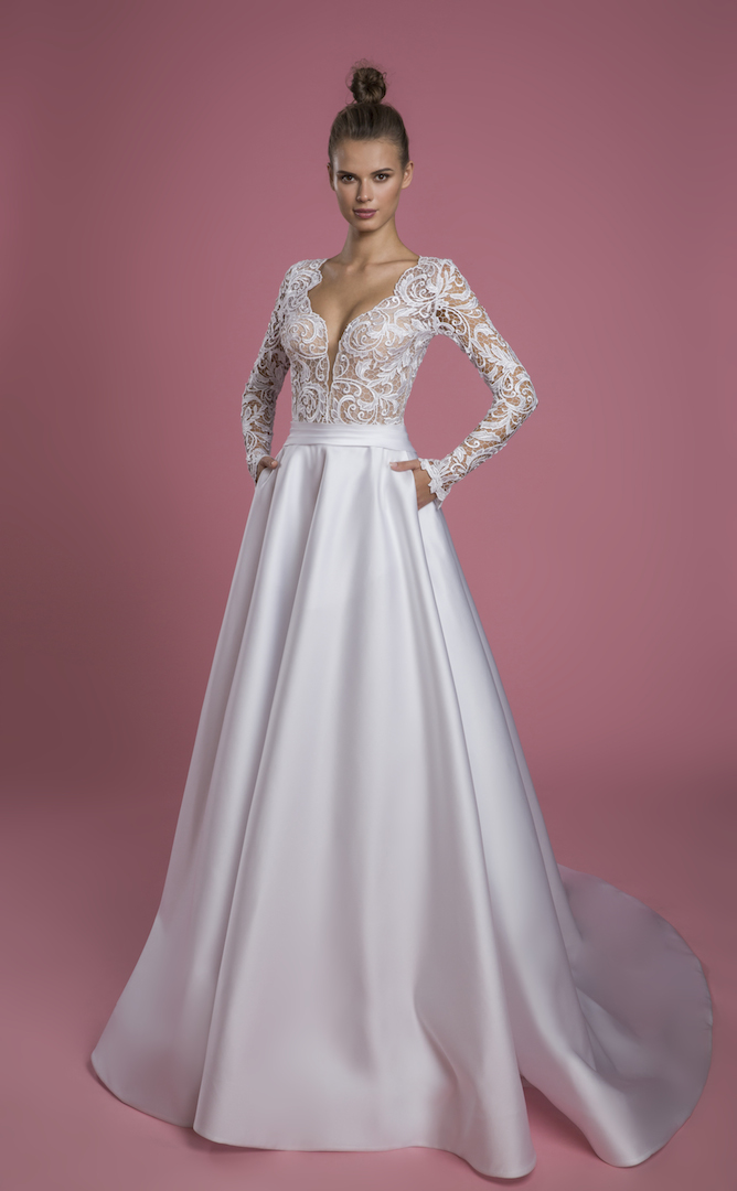 a line long sleeve wedding dress with lace bodice and satin skirt