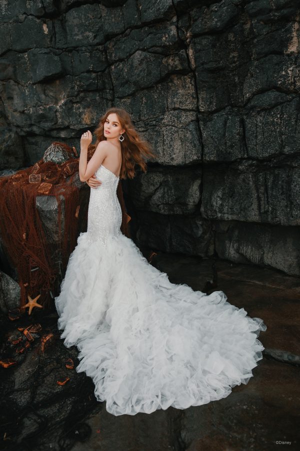 https://www.kleinfeldbridal.com/wp-content/uploads/2022/02/disney-fairy-tale-weddings-collection-strapless-sweetheart-neckline-mermaid-wedding-dress-with-beaded-bodice-and-ruffled-skirt-34478867-1-600x900.jpg