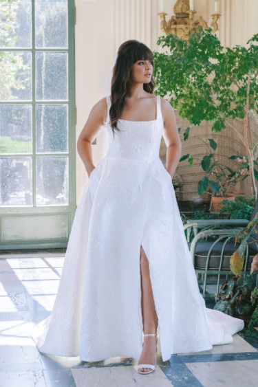 https://www.kleinfeldbridal.com/wp-content/uploads/2022/03/anne-barge-floral-jacquard-a-line-wedding-dress-with-square-neckline-and-front-slit-34483933.jpg
