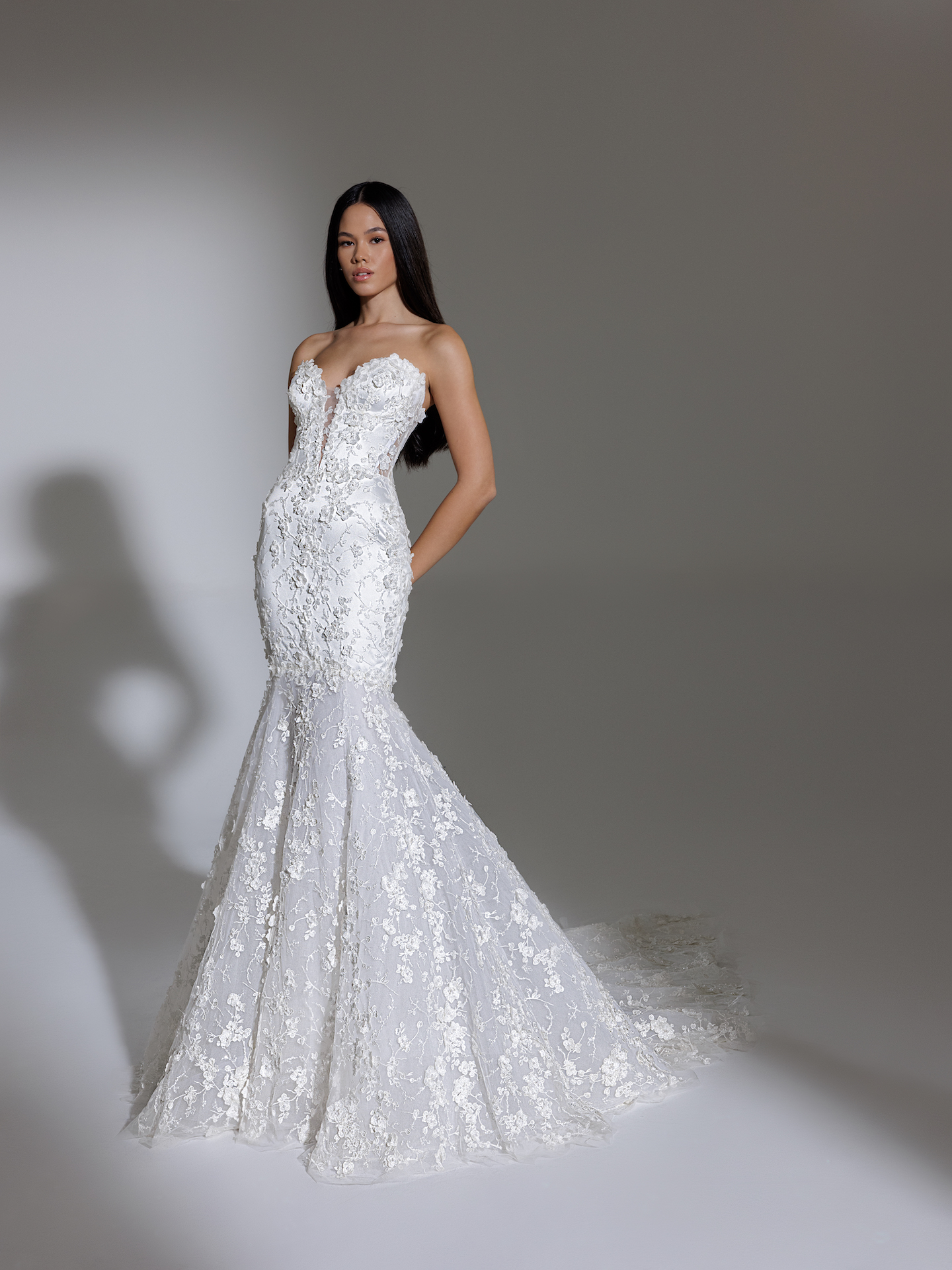 https://www.kleinfeldbridal.com/wp-content/uploads/2022/03/pnina-tornai-strapless-deep-v-illusion-neckline-floral-lace-mermaid-wedding-dress-34482877.jpeg