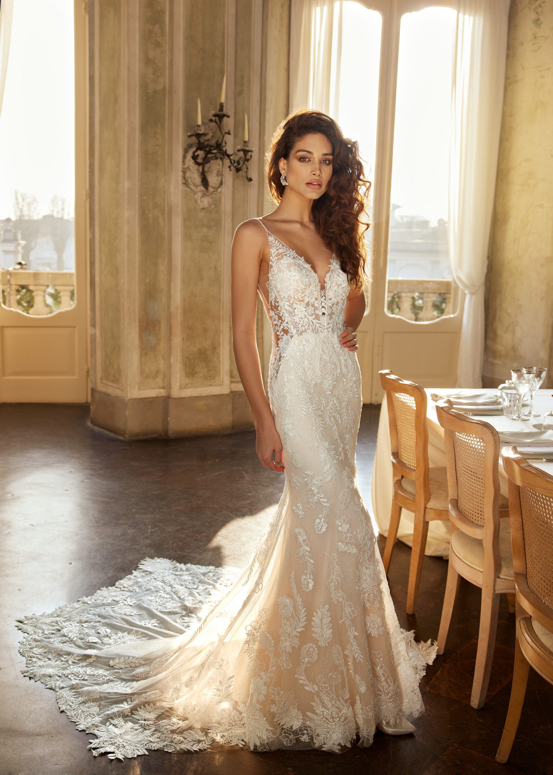 https://www.kleinfeldbridal.com/wp-content/uploads/2022/09/randy-fenoli-spaghetti-strap-v-neckline-fit-and-flare-lace-wedding-dress-with-back-details-34587451.jpg