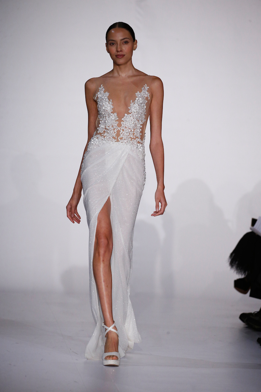 https://www.kleinfeldbridal.com/wp-content/uploads/2022/10/pnina-tornai-sleeveless-deep-v-neckline-sheath-wedding-dress-with-illusion-bodice-and-glitter-skirt-with-front-slit-34605121.jpg