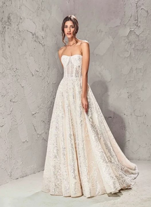 https://www.kleinfeldbridal.com/wp-content/uploads/2023/03/tony-ward-strapless-a-line-wedding-dress-with-corset-bodice-34668483.jpg