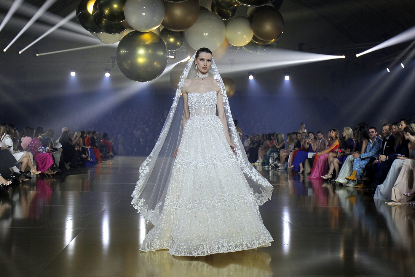 Walk this way: Runway show features dozens of dresses for brides, bridal  party