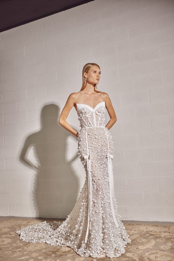 Bow-Adorned Floral Fit-and-Flare Wedding Dress With Overskirt by Tal Kedem Bridal Couture - Image 1