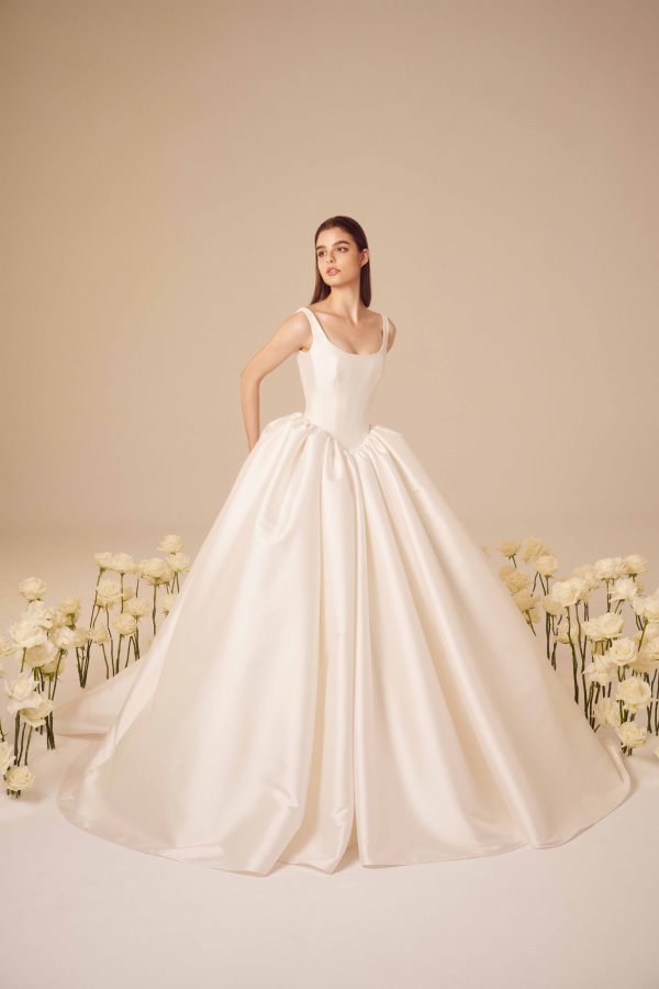 Dramatic And Elegant Basque-Waist Ball Gown by Nicole + Felicia - Image 1