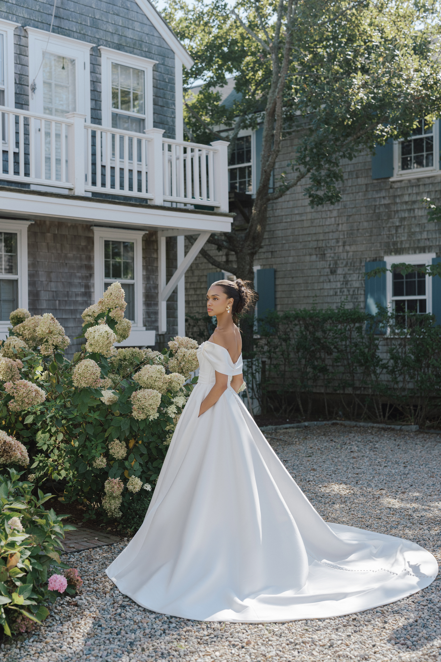 Simple And Modern Off-the-Shoulder A-Line Gown With Slit by Anne Barge - Image 2