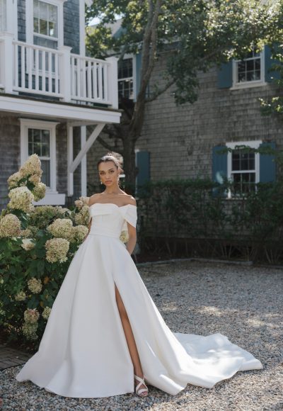 Simple And Modern Off-the-Shoulder A-Line Gown With Slit by Anne Barge
