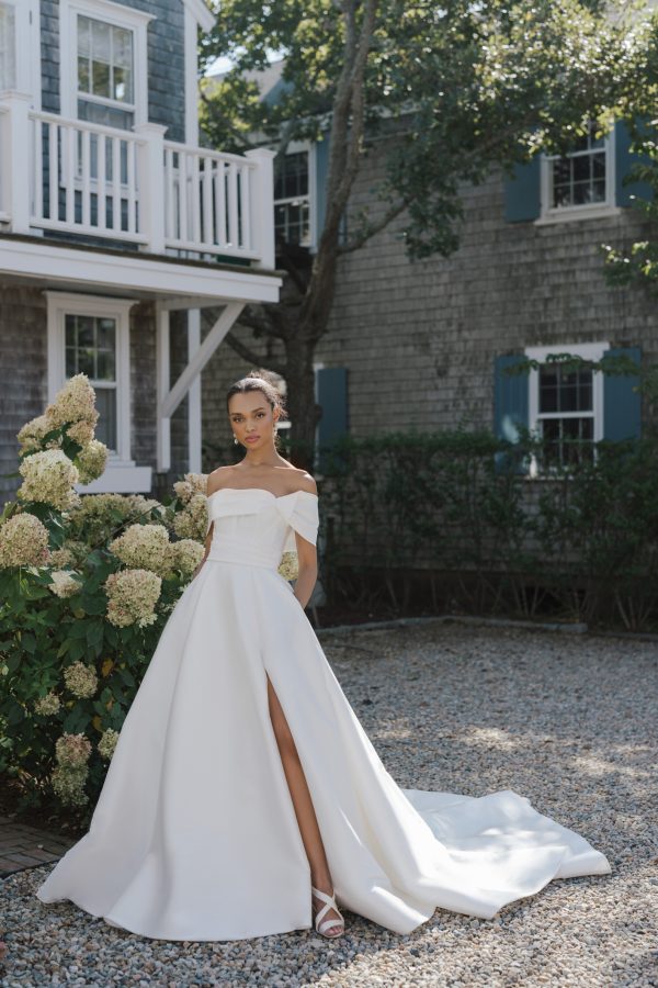 Simple And Modern Off-the-Shoulder A-Line Wedding Dress With Slit by Anne Barge - Image 1