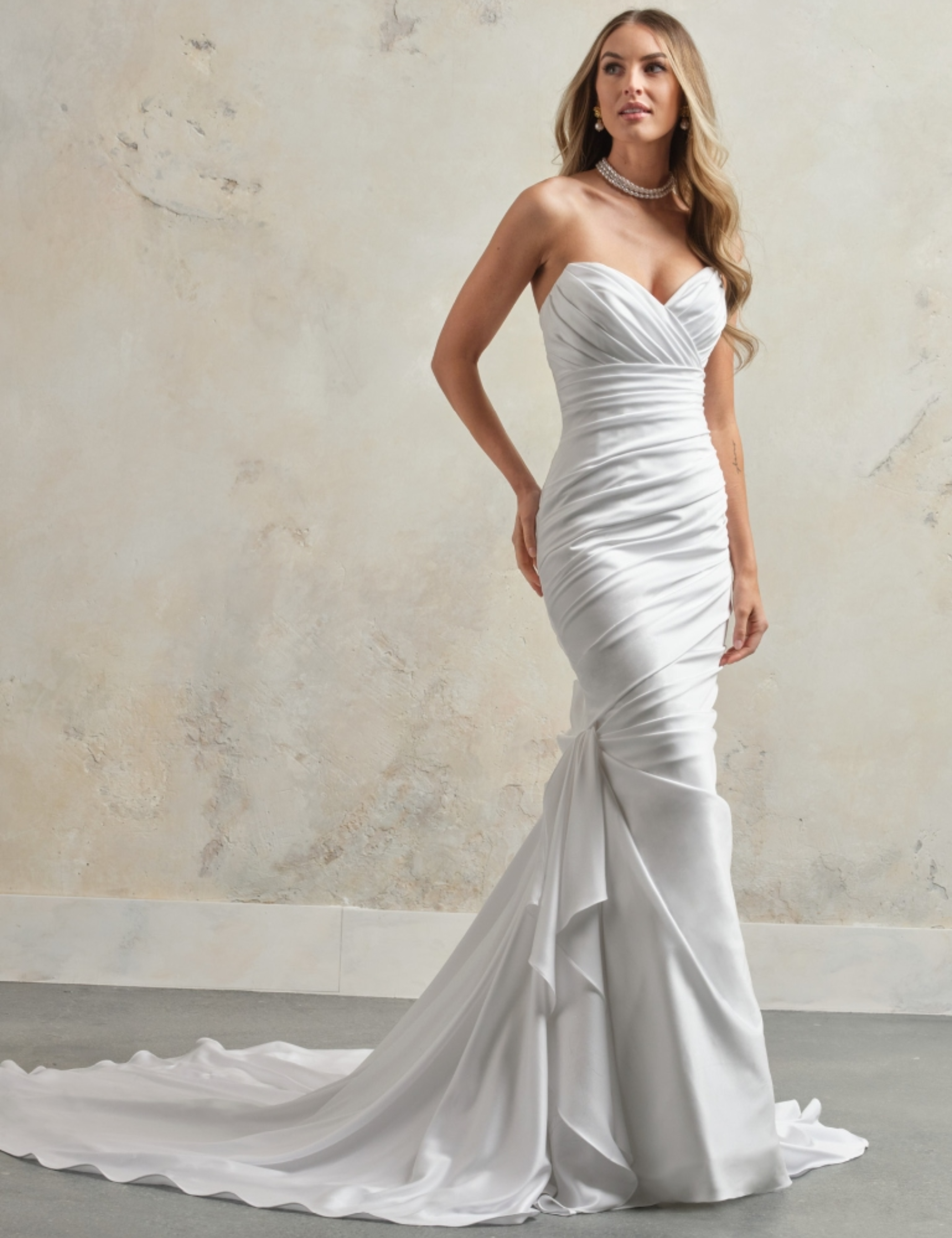 Dramatically Draped Satin Fit-and-Flare Wedding Dress by Maggie Sottero - Image 1