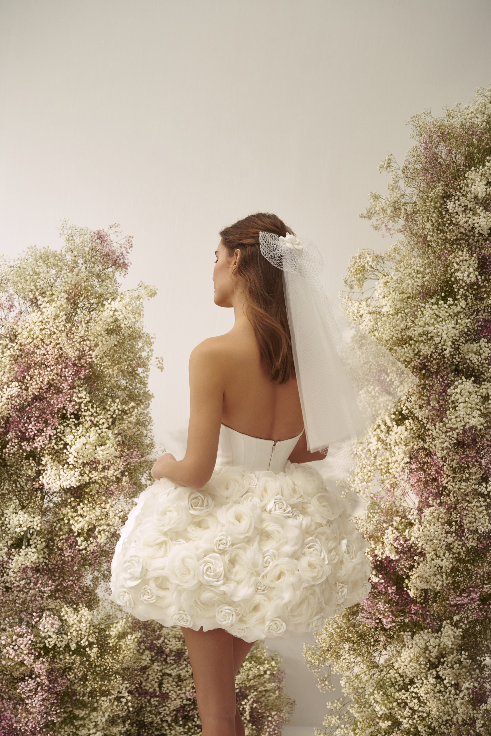 Chic And Feminine Floral Bridal Mini Dress by Nicole + Felicia - Image 2