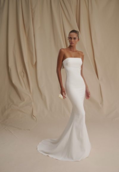 Sleek And Simple Fit-and-Flare Wedding Dress With Open Back And Bow by Senstudio