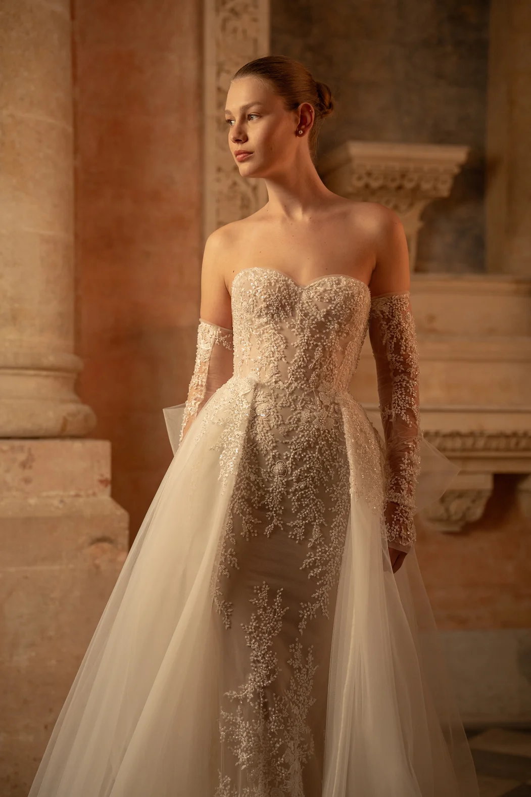 Embellished Floral Fit-and-Flare Wedding Dress With Detachable Sleeves, Overskirt, And Bow by Lee Petra Grebenau - Image 3