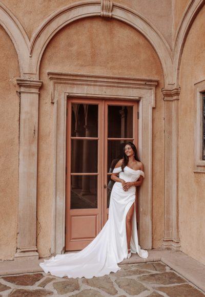 Chic And Modern Fit-and-Flare Wedding Dress With Slit And Detachable Off-The-Shoulder Shawl by Essense of Australia