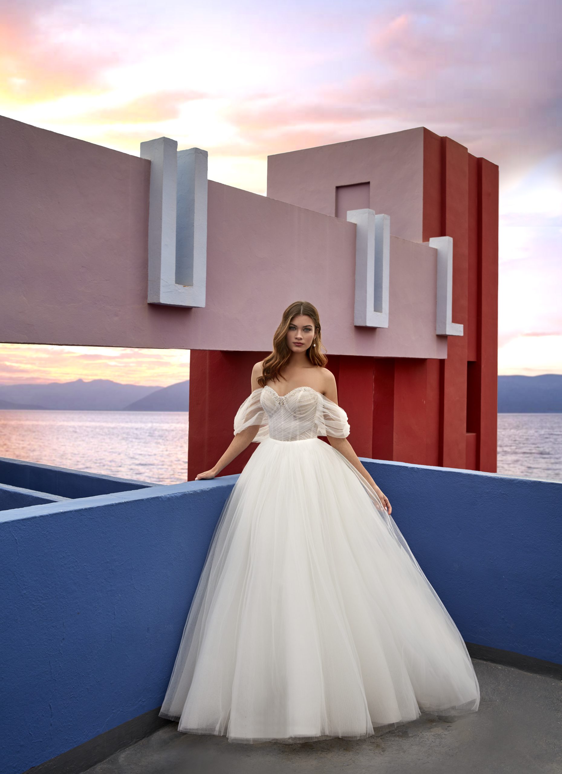 Ethereal And Simple Off-the-Shoulder Tulle Ball Gown With Buttons by Madison James - Image 1