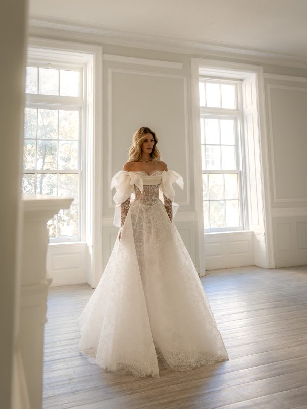 Romantic Off-The-Shoulder Long Sleeve Lace A-Line Wedding Dress With Bows by Pnina Tornai - Image 1