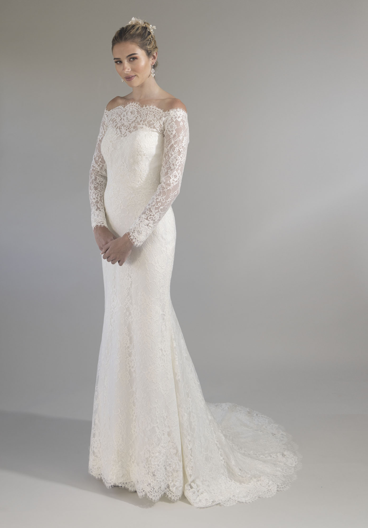 Classic Off-the-Shoulder Long Sleeve Lace Fit-and-Flare Wedding Dress With Buttons by Augusta Jones - Image 1