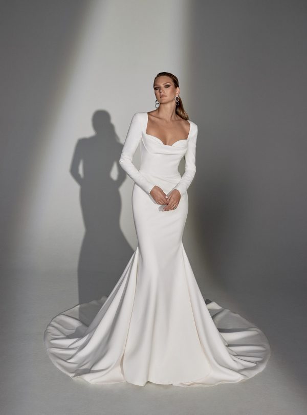 Chic And Simple Long Sleeve Fit-and-Flare Wedding Dress With Open Back And Buttons by Justin Alexander Signature - Image 1