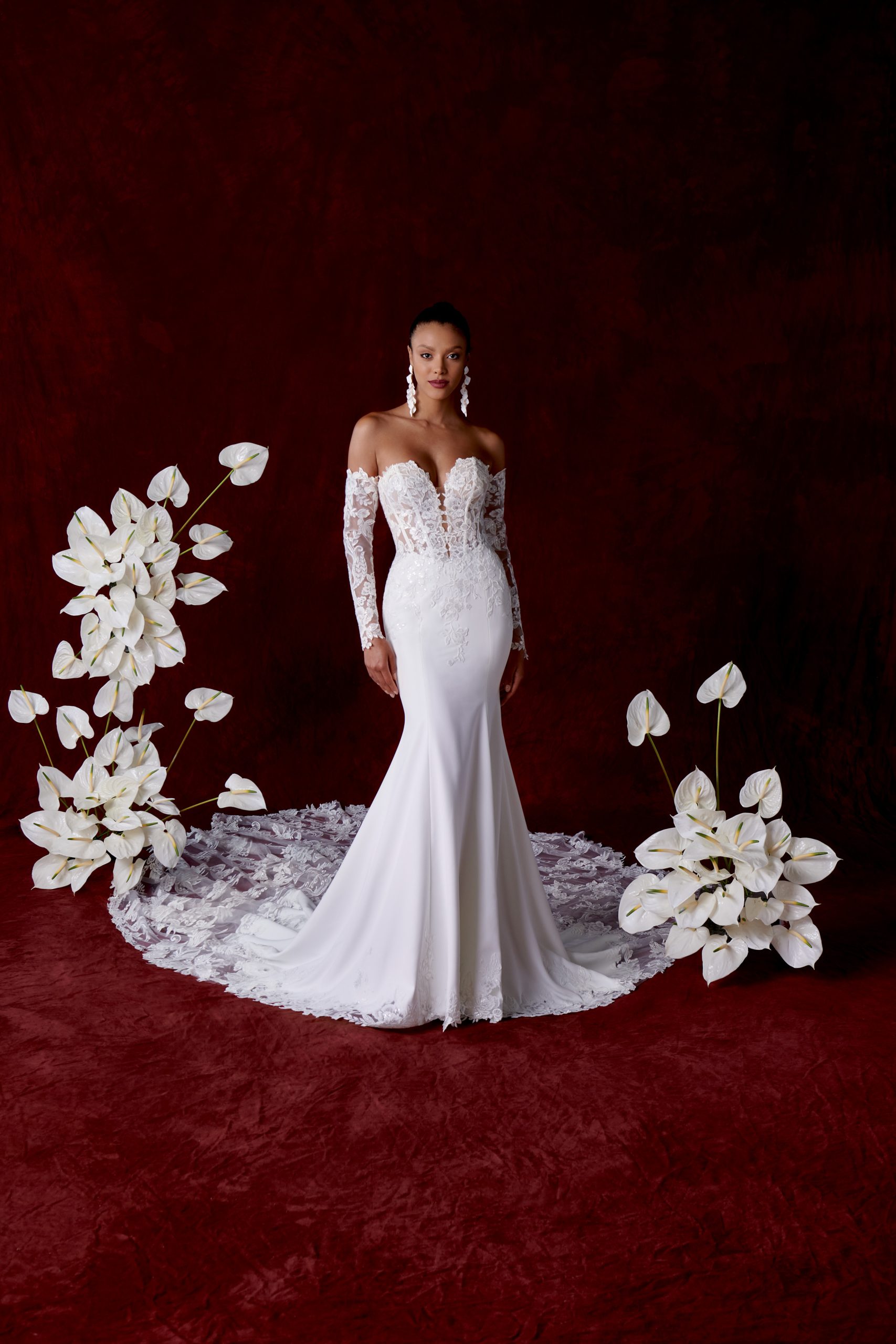 Romantic And Dramatic Lace Fit-and-Flare Wedding Dress With Detachable Train by Justin Alexander - Image 1