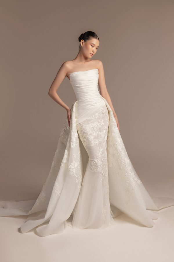 Sleek And Romantic Fit-and-Flare Wedding Dress With Overskirt by Tony Ward - Image 1