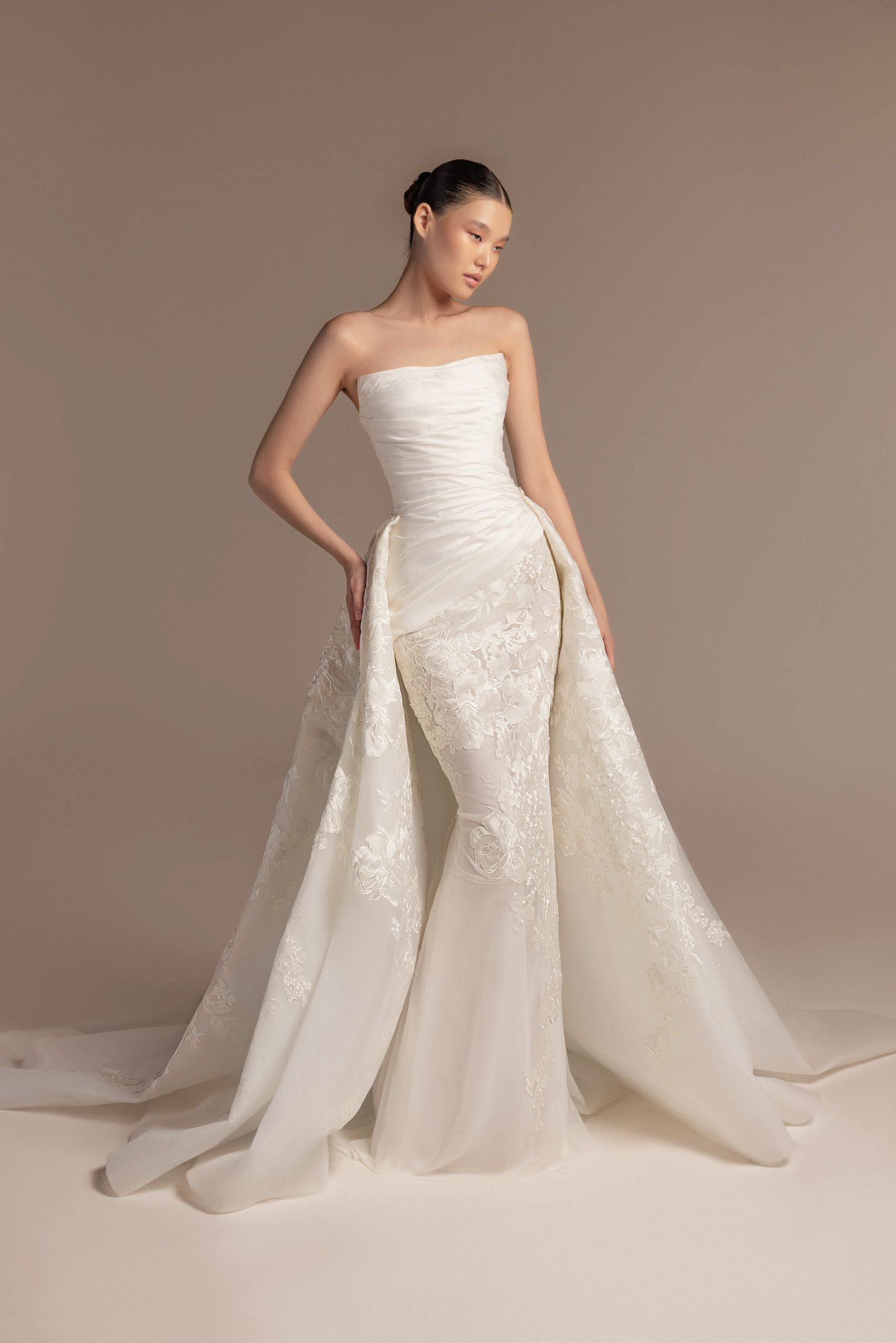 Sleek And Romantic Fit-and-Flare Wedding Dress With Tulle Overskirt by Tony Ward - Image 1