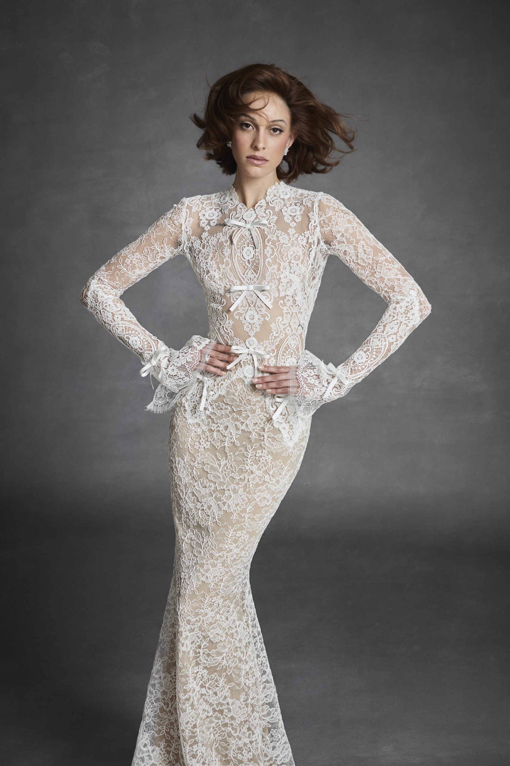 Lace Long Sleeve Fit-and-Flare Wedding Dress With Bows And Key-Hole Back by Jaclyn Whyte - Image 1