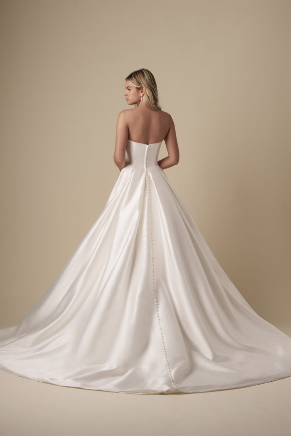 Chic And Timeless Strapless A-Line Wedding Dress With Slit by Kleinfeld Collection - Image 3