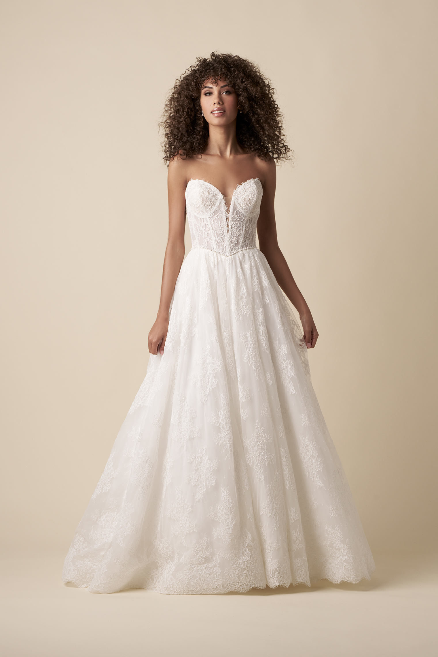 Chic And Feminine Lace Basque-Waist A-Line Wedding Dress With Buttons by The Kleinfeld Collection - Image 1