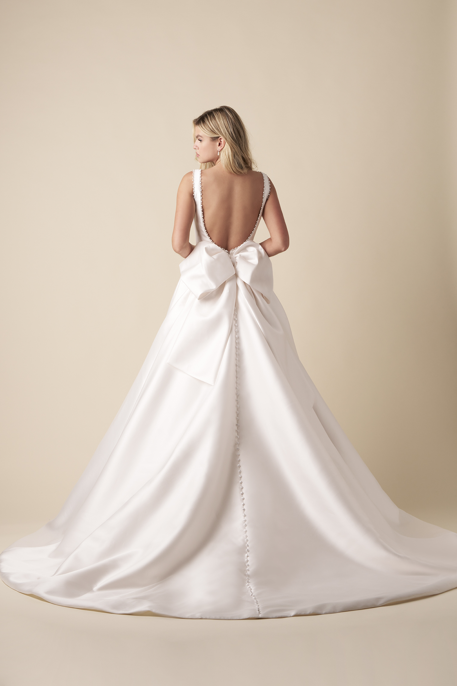 Timeless And Simple Square-Neck Ball Gown With Bow by The Kleinfeld Collection - Image 3