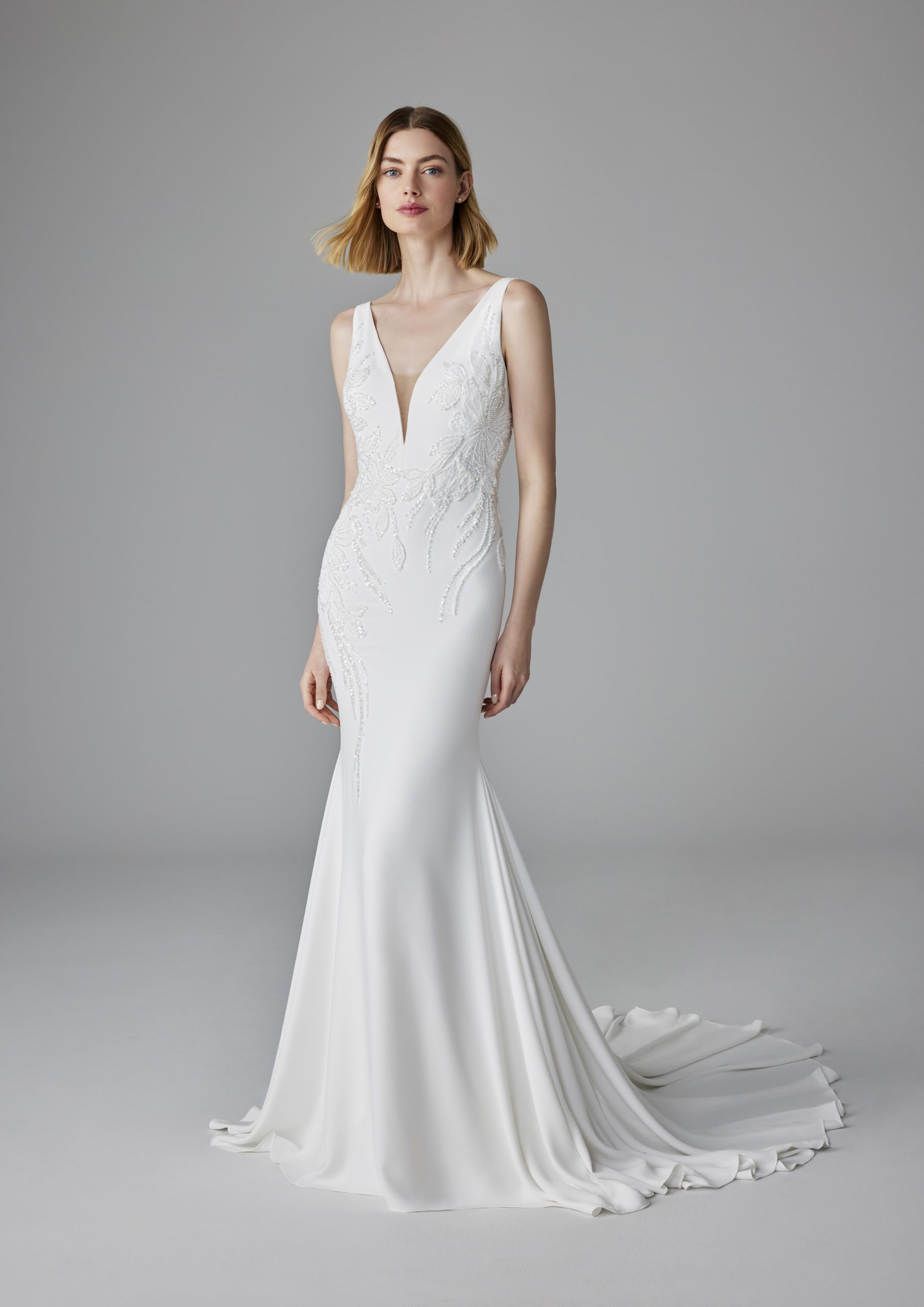 Sleek And Sophisticated V-Neck Sheath Wedding Dress by Pronovias - Image 1