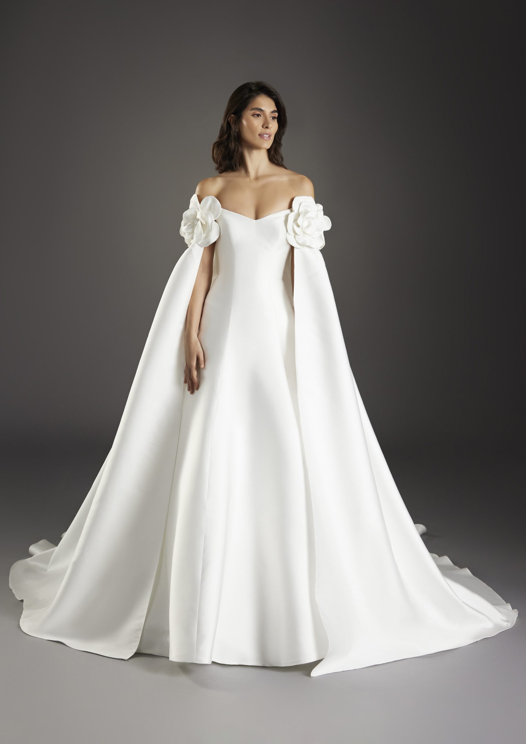 Unique And Romantic Modified A-Line Wedding Dress With 3D Floral Cape by Pronovias - Image 1