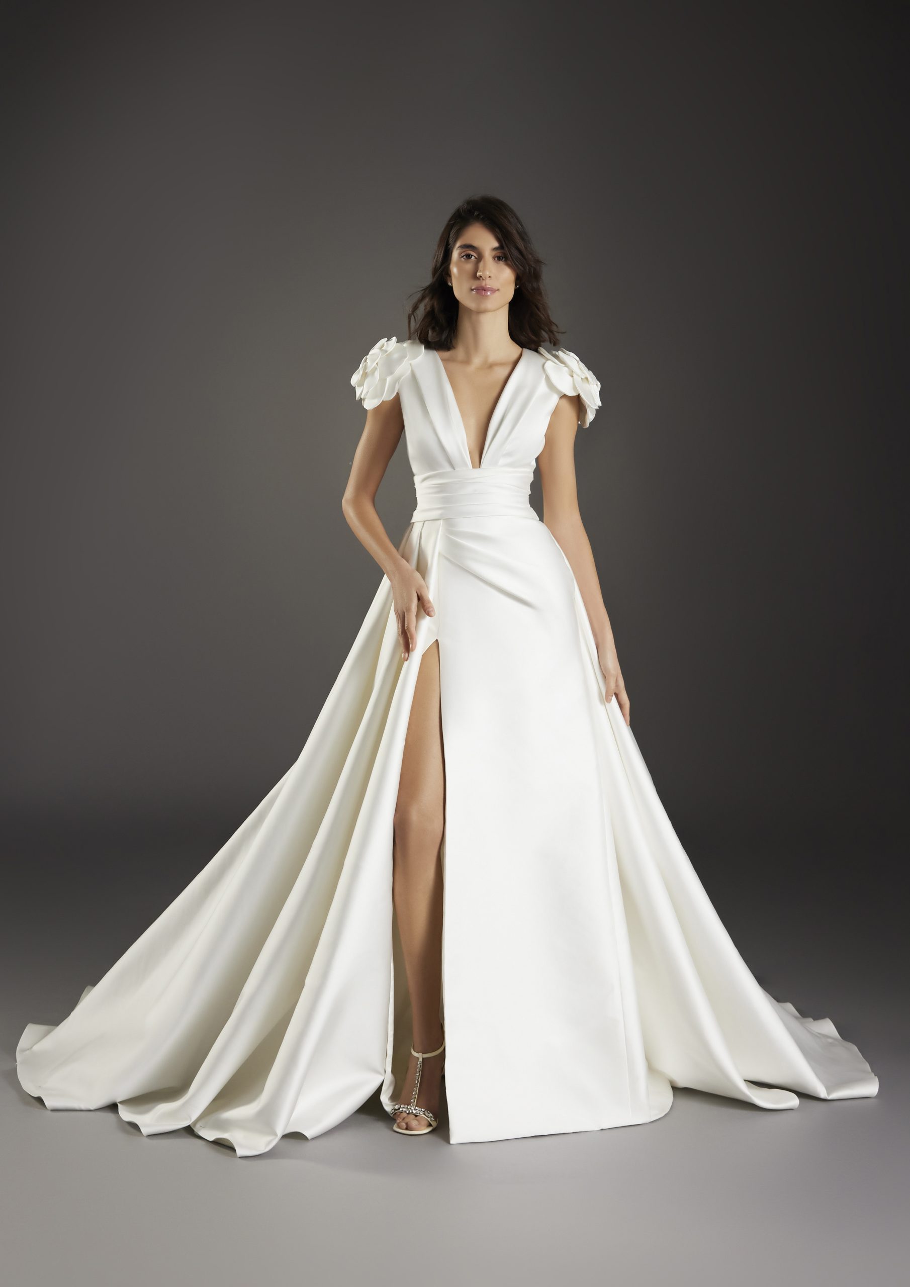 Sophisticated V-Neck Sheath Wedding Dress With Detachable Overskirt by Pronovias - Image 1