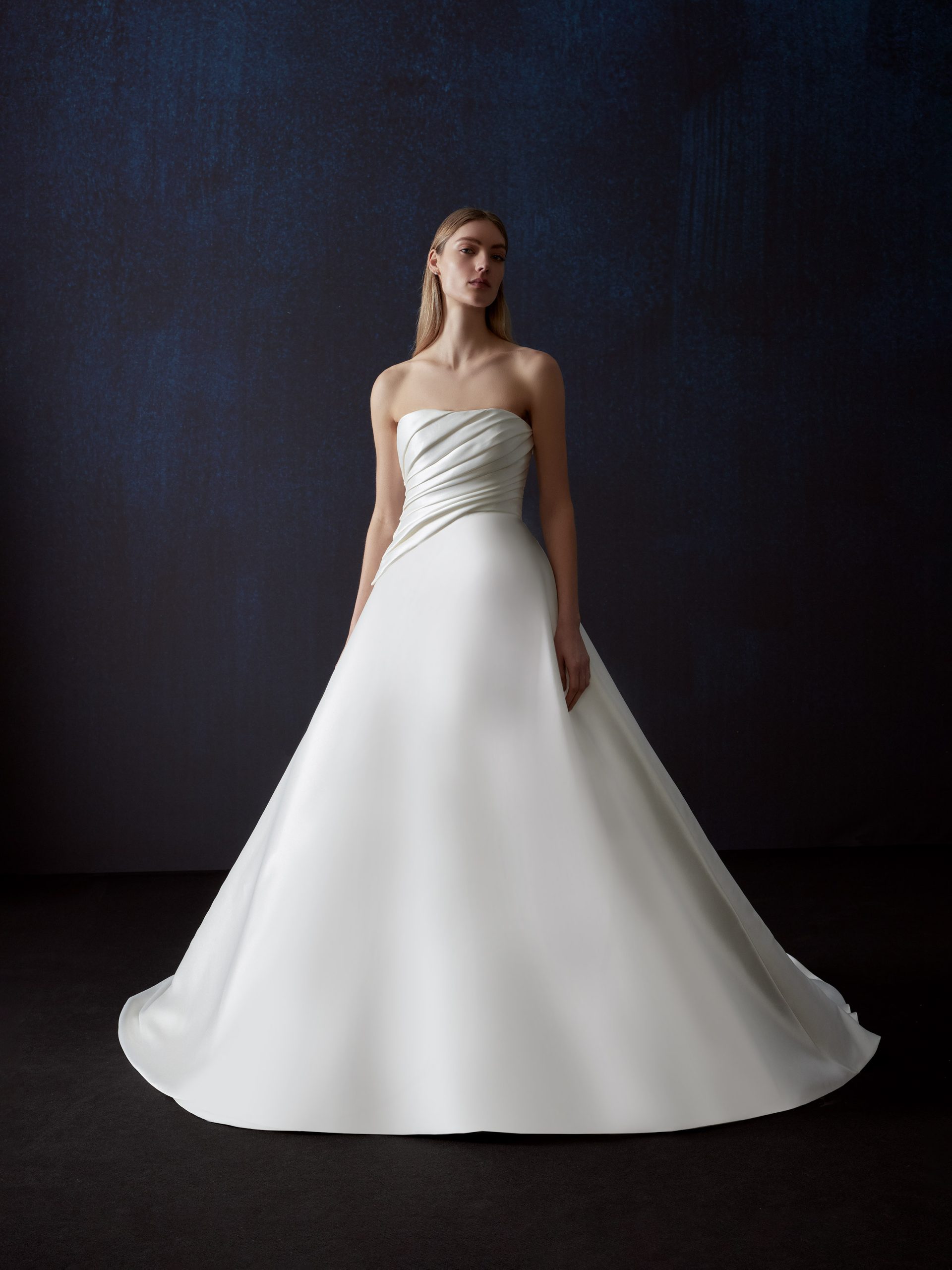 Simple And Chic Draped Ball Gown With Layered Train by Pronovias - Image 1