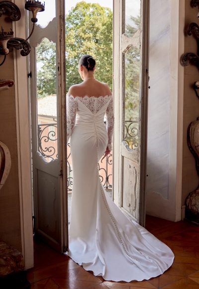 Off-The-Shoulder Long Sleeve Sheath Wedding Dress With Slit And Buttons by Justin Alexander - Image 2