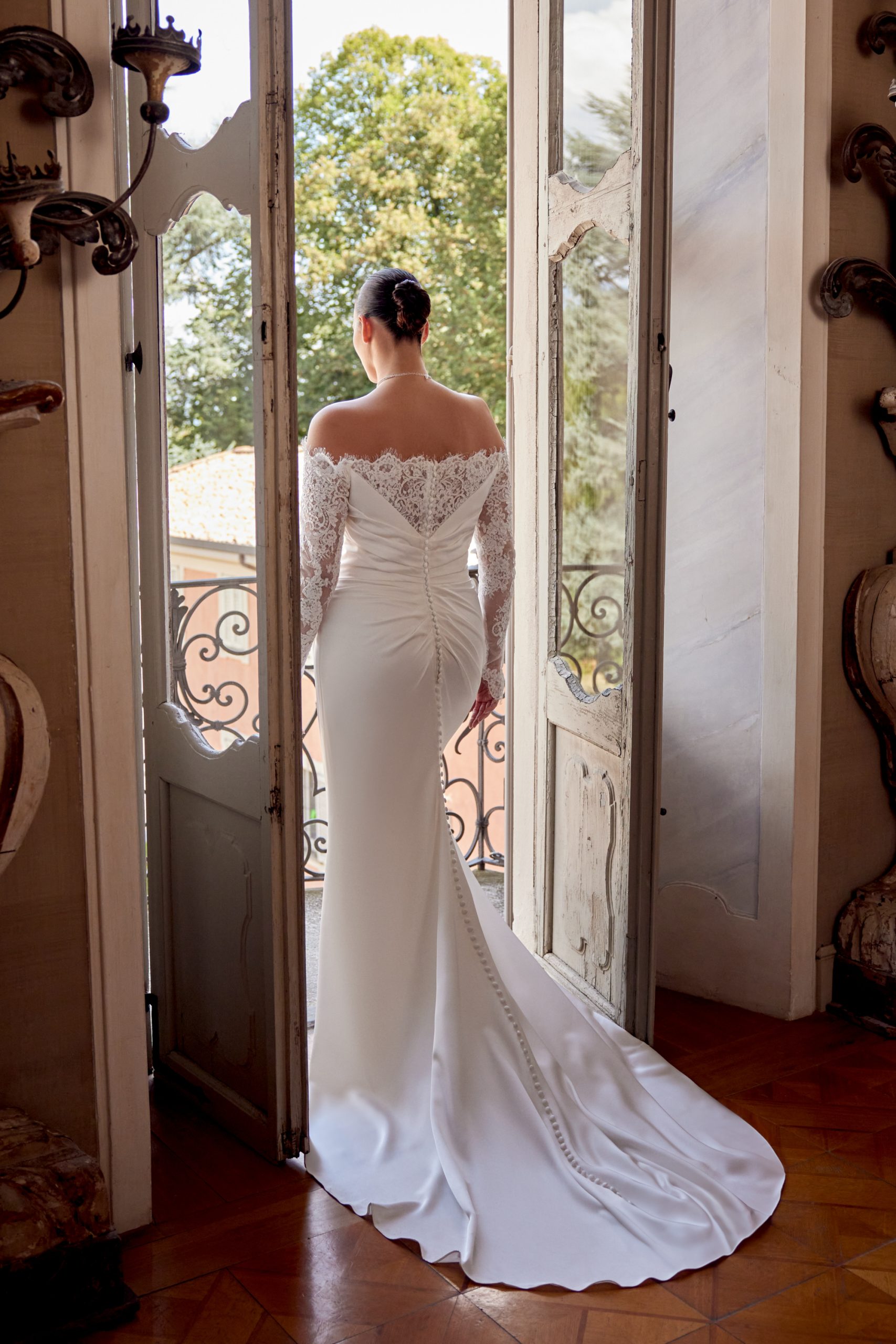 Off-The-Shoulder Long Sleeve Sheath Wedding Dress With Slit And Buttons by Justin Alexander - Image 2