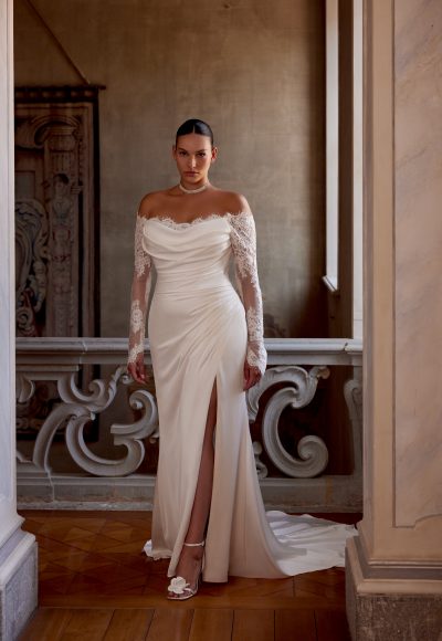 Off-The-Shoulder Long Sleeve Sheath Wedding Dress With Slit And Buttons by Justin Alexander