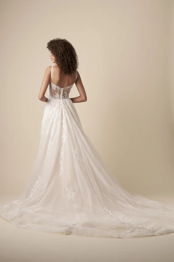 Unique and Sparkly Fit-and-Flare Wedding Dress With Overskirt by Kleinfeld Collection - Image 4