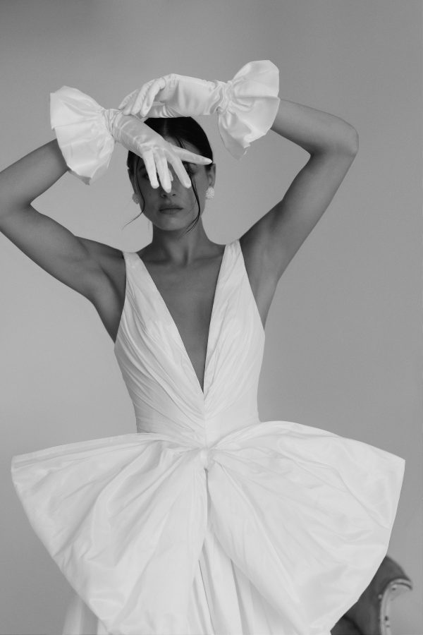 Sophisticated And Dramatic V-Neck A-Line Wedding Dress With Bow by Tal Kedem Bridal Couture - Image 1